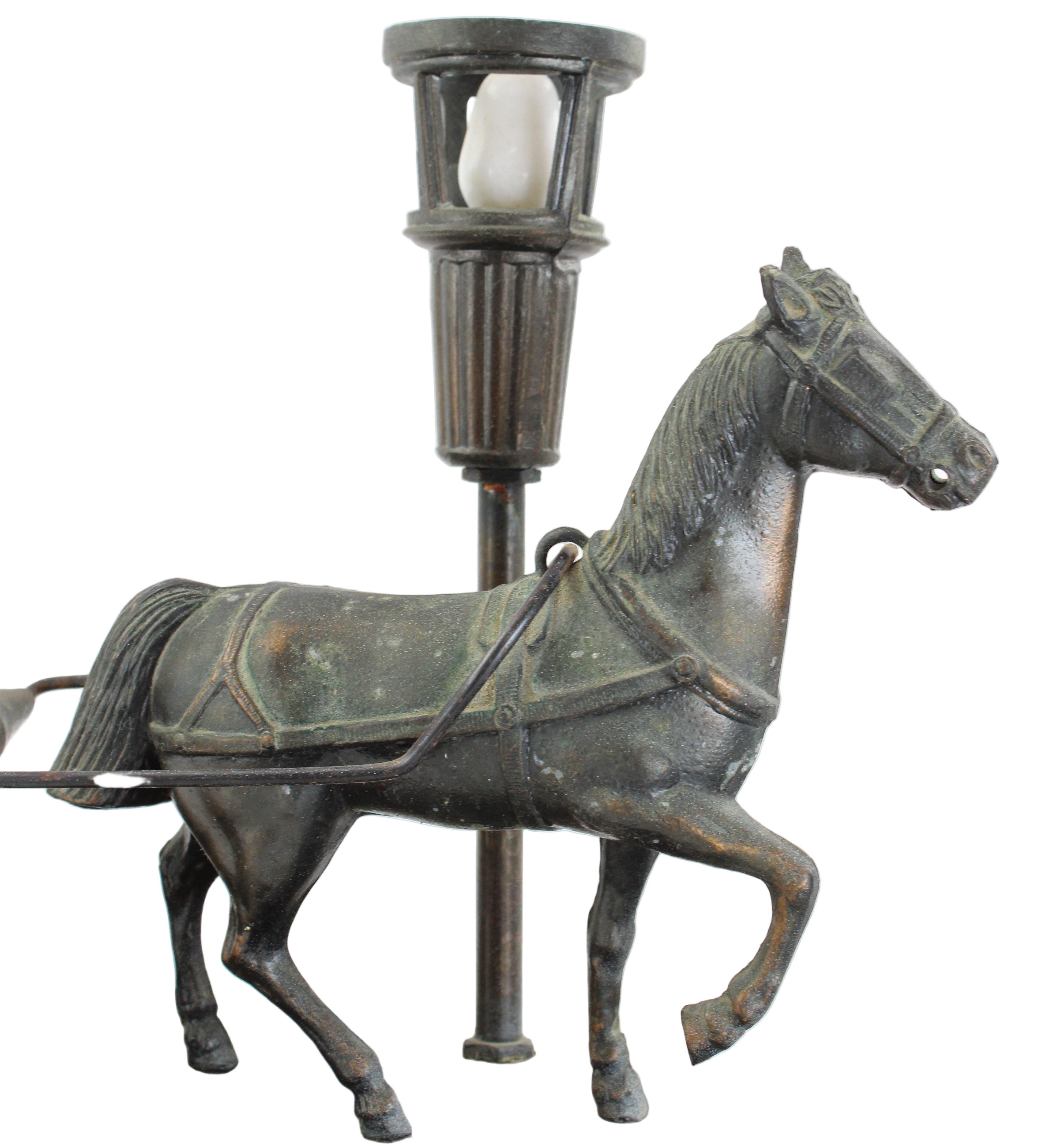Bronze horse-shaped wall sconce on a white background