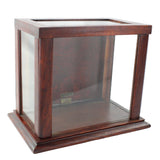 Wooden display case with glass front on a white background
