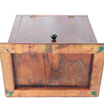 Wooden box with a lid on a white background