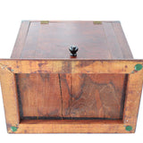 Wooden box with a lid on a white background