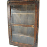 Wooden display case with glass panels on a white background