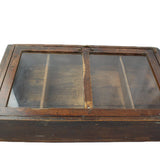 Wooden display case with glass panels on a white background