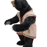 Black bear plush toy wearing a patterned coat on a white background