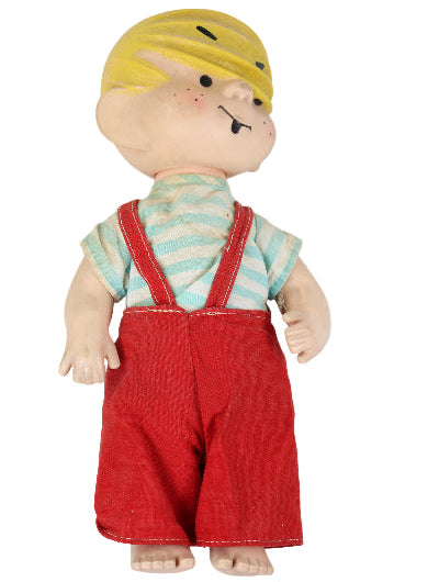 Toy figure with blonde hair, striped shirt, and red overalls on a white background