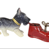 Toy dog with a red boot on a white background