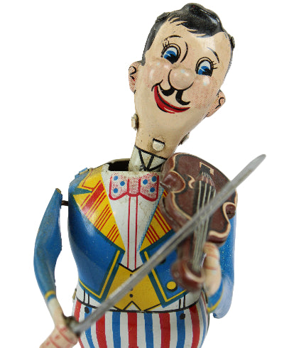 Colorful vintage toy figure of a man playing a violin on a white background