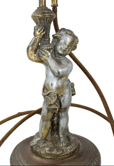 Decorative lamp with cherub holding a cornucopia on a white background