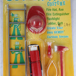 Toy figure set in a 'Gumby' fireman costume on a yellow card with 'Gumby' branding.