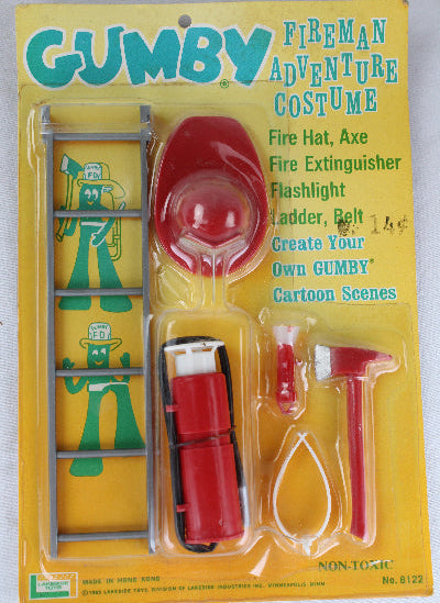 Toy figure set in a 'Gumby' fireman costume on a yellow card with 'Gumby' branding.