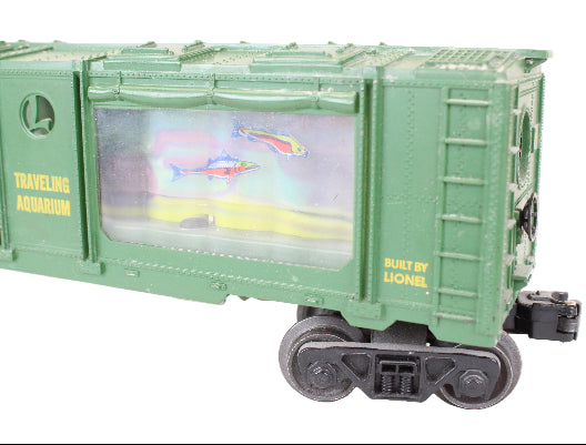Toy train car with a screen displaying an aquarium scene, built by Lionel.