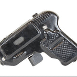 Black gun-shaped device on a white background