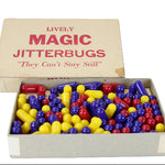 Box of colorful 'Magic Jitterbugs' toys with a vintage design.
