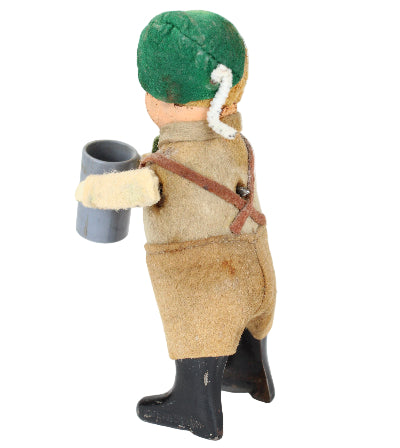Toy figure with a green head and brown body on a white background