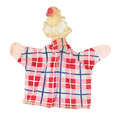 Puppet with a red and blue plaid shirt on a white background