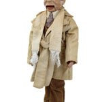 Vintage doll with a beige suit and brown shoes on a white background