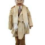 Vintage doll in a beige suit with a white shirt and brown shoes on a white background