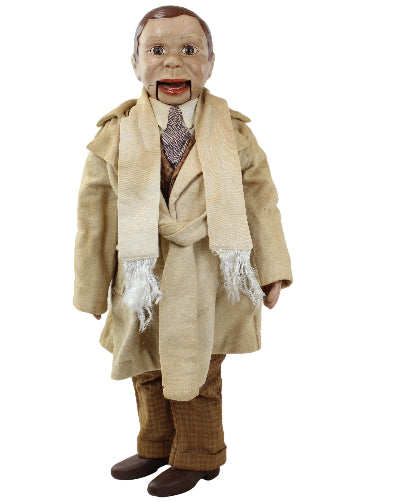 Vintage doll in a beige suit with a white shirt and brown shoes on a white background