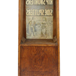 Wooden box with a vintage newspaper inside on a white background