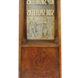 Wooden box with a vintage newspaper inside on a white background