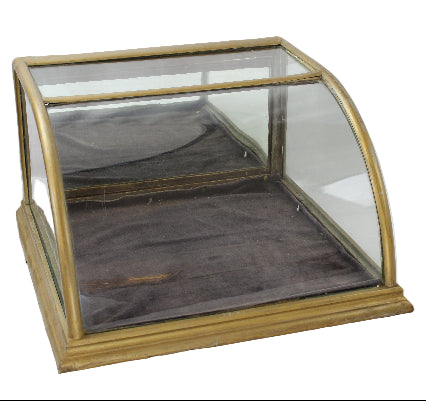 Glass display case with brass frame on a white background