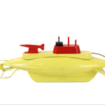 Yellow toy submarine with red controls on a white background