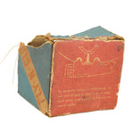 Vintage cardboard box with red and blue design on a white background