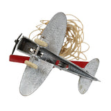 Toy airplane with a string on a white background