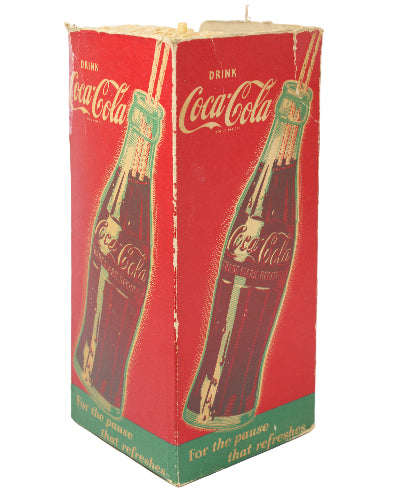 Red Coca-Cola box with green accents featuring a bottle design on a white background