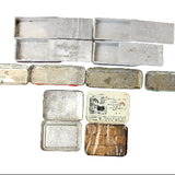 Collection of vintage metal boxes on a white background