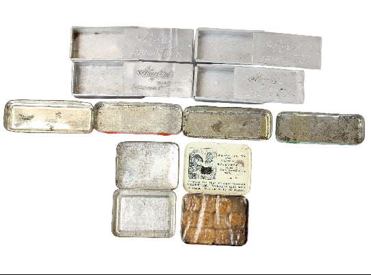 Collection of vintage metal boxes on a white background