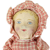 Vintage doll with a checkered dress on a white background