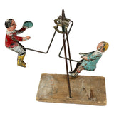 Antique Gibbs Children On A Teeter Totter Motion Tin Toy