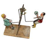 Antique Gibbs Children On A Teeter Totter Motion Tin Toy