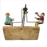 Antique Gibbs Children On A Teeter Totter Motion Tin Toy