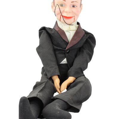 Vintage-style mannequin in a suit with a white shirt on a white background