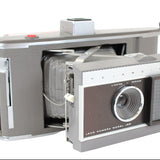 Early 1960's Polaroid Land Camera Model J66, Flash, Bulbs & Original Rawhide Case