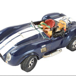 Model of a blue car with a scenic interior on a white background