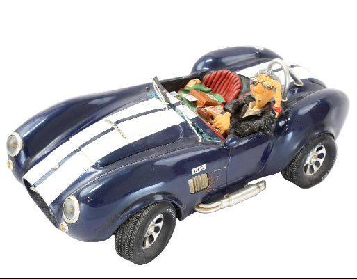 Model of a blue car with a scenic interior on a white background