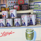 Display case with Libby's canned goods and other products.