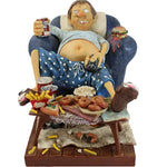 Decorative figurine of a person with a basket of food on a white background