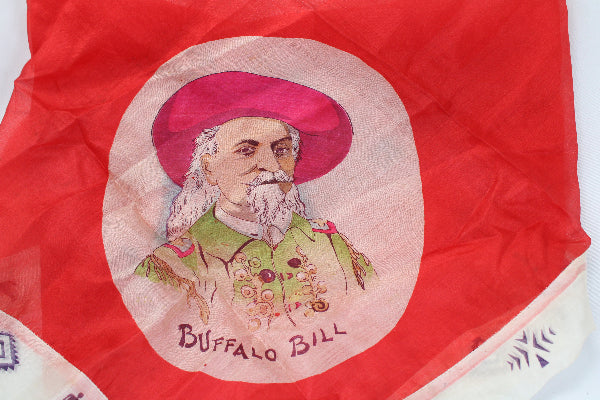 Red fabric with a portrait of a man in a pink hat and 'Buffalo Bill' text.