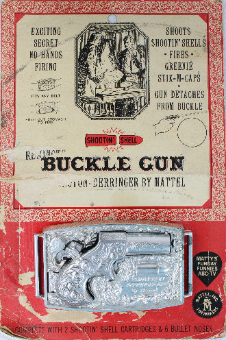 Vintage packaging of a buckle gun toy by Mattel on a white background