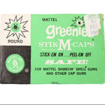 Box of Mattel Greenie Stik M-Caps on a white background