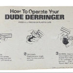 Instructions for operating a 'Dude Derringer' on a beige background
