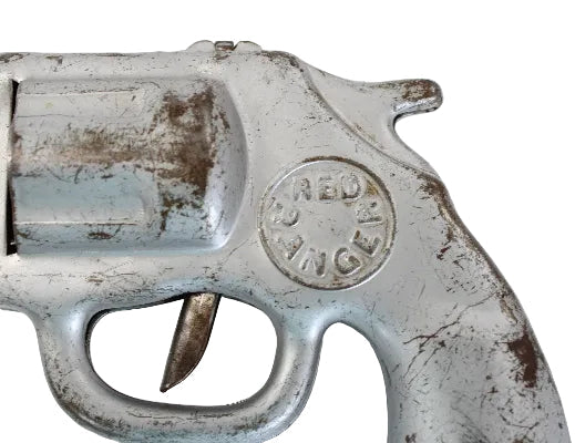 Vintage revolver with 'Red Hand' branding on a white background