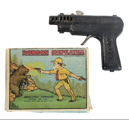 Ronson Repeater toy gun with packaging featuring a hunter and bear illustration on a white background.