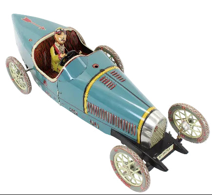 Vintage-style toy car with a driver figure on a white background