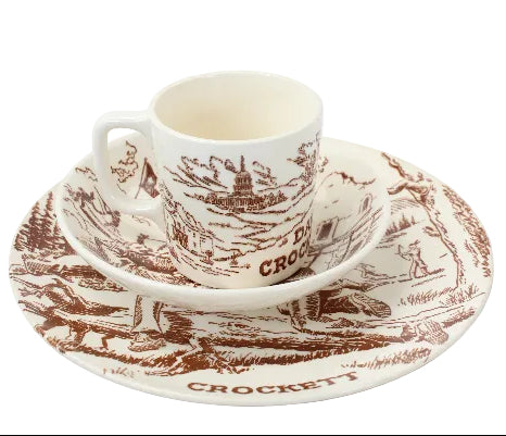 Crockery set with a cup and saucer on a white background