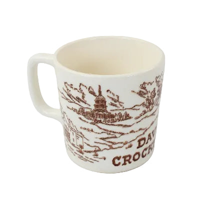 White mug with brown text and graphics on a white background