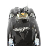 Black Batmobile toy on a white background